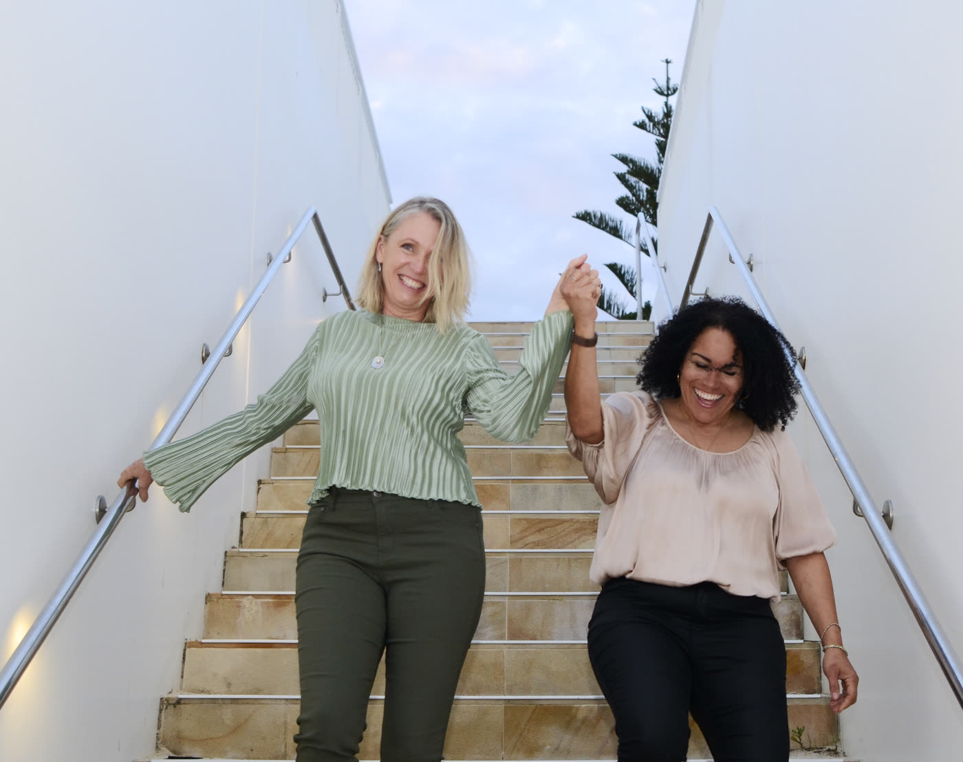 Laila and Jodie on a limestone stairway